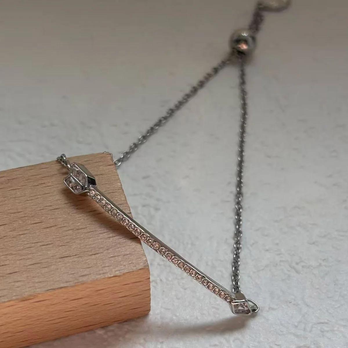 Nouvel ensemble de bijoux raffinés 2026 : Boucles d'oreilles flèche en or et cristal, collier, boucl