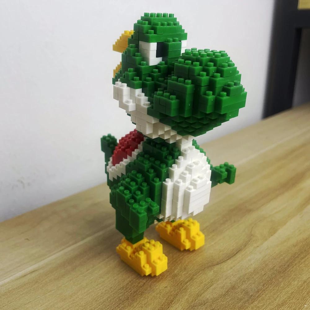 Ensemble de jouets de blocs de construction de dinosaures: vélociraptor vert et tyrannosaure, embarq