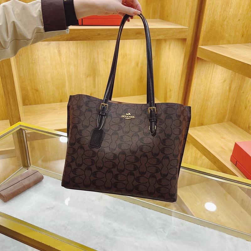 Sac à langer bandoulière tendance en cuir haut de gamme, style classique de créateur, décontracté, s