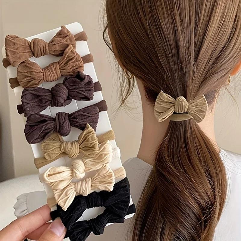 Porte-queue de cheval en tissu à haute élasticité avec nœud papillon de couleur unie – Accessoires p
