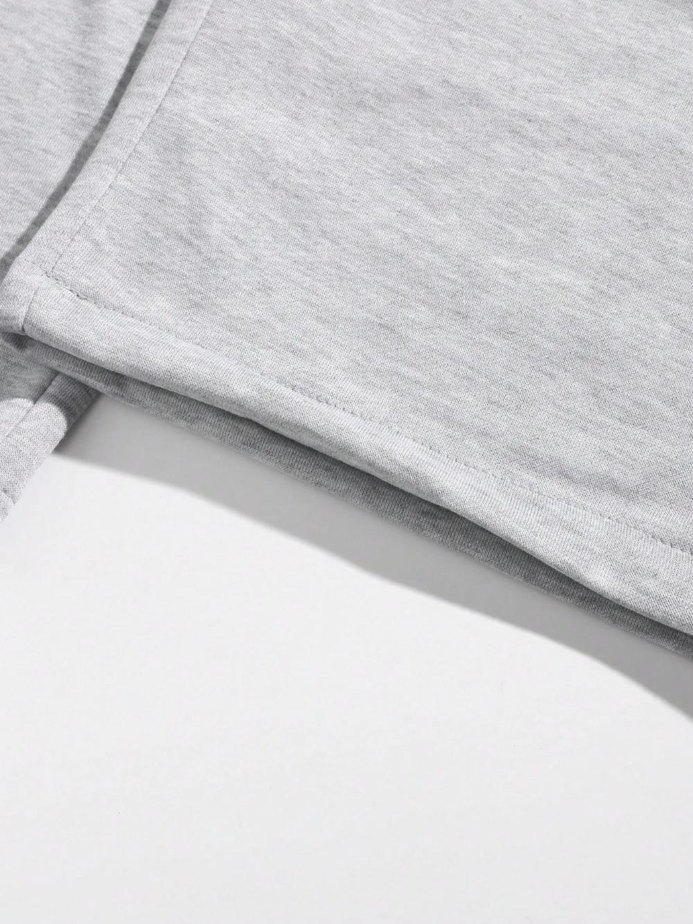 Shorts amples décontractés pour hommes, couleur unie, avec poches obliques, style estival élégant et