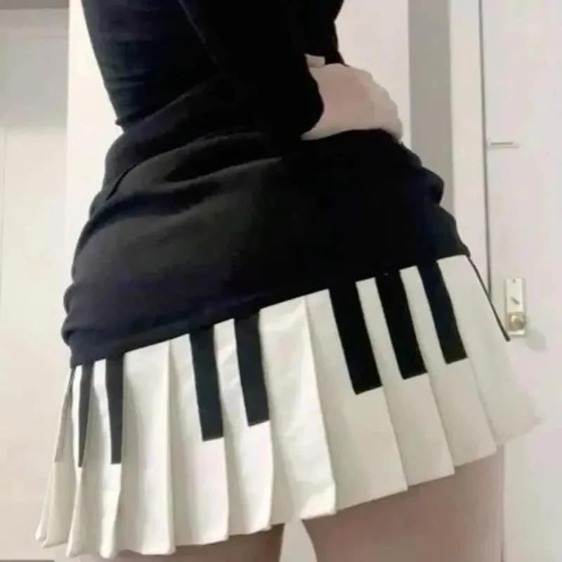 Printemps noir blanc épissé femmes jupe courte Y2k conception mince Harajuku Mini jupe femme Empire 