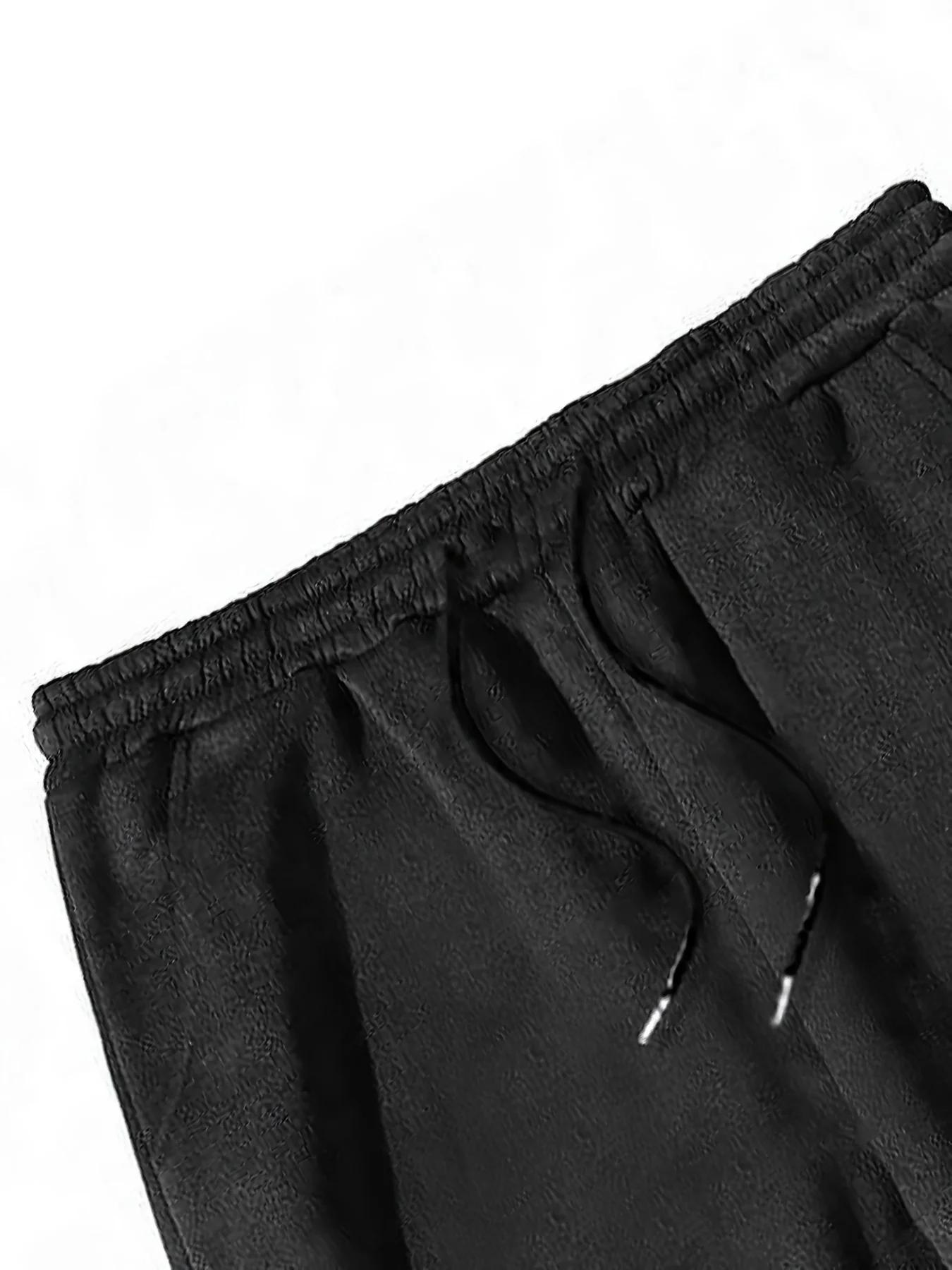 2025 Pantalon à jambes larges noir pour hommes à la mode Grande croix blanche imprimée Pantalon hip-