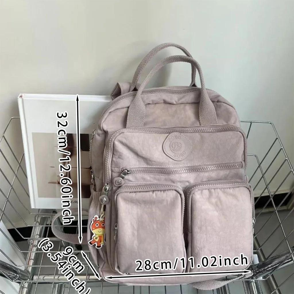 Sac à dos multi-poches pour femmes, sac à dos de voyage en Nylon de couleur unie à poignée souple, l