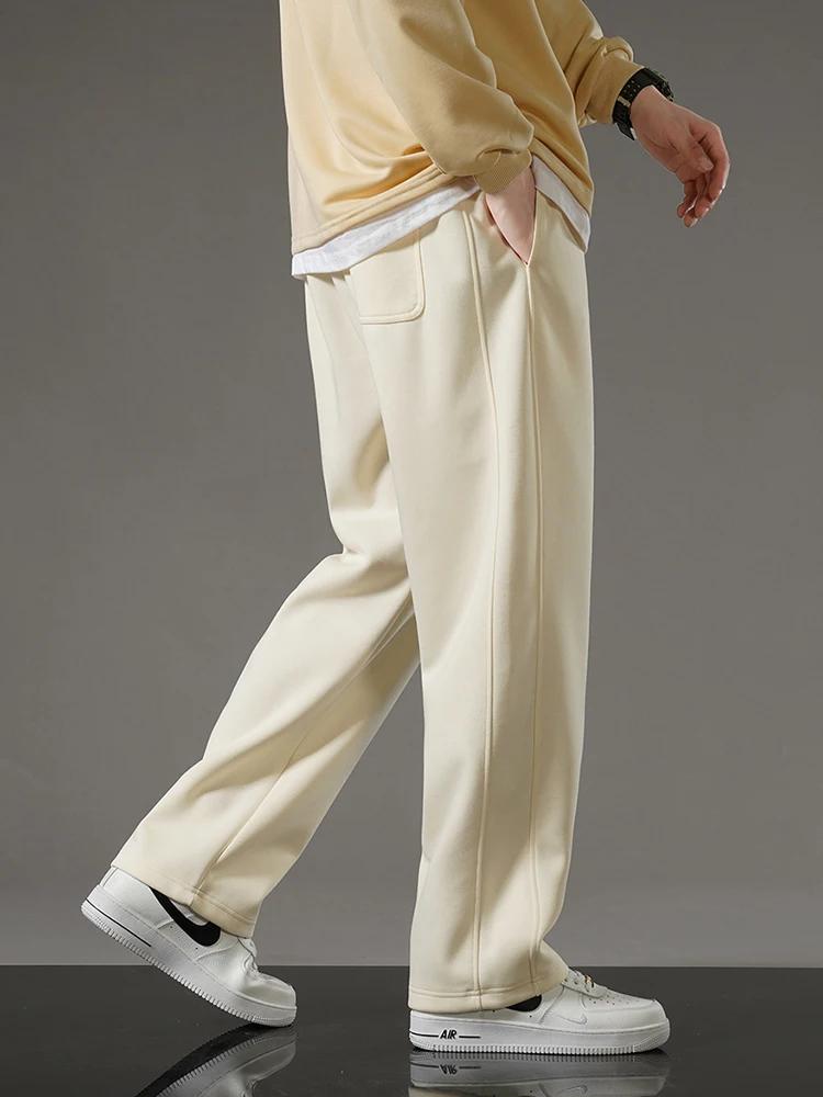 Printemps automne hommes pantalons de survêtement mode coréenne vêtements de sport cordon jambe larg