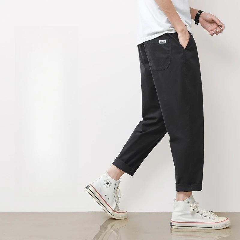 Pantalon décontracté pour homme en coton respirant, couleur unie gris kaki, idéal pour le printemps 
