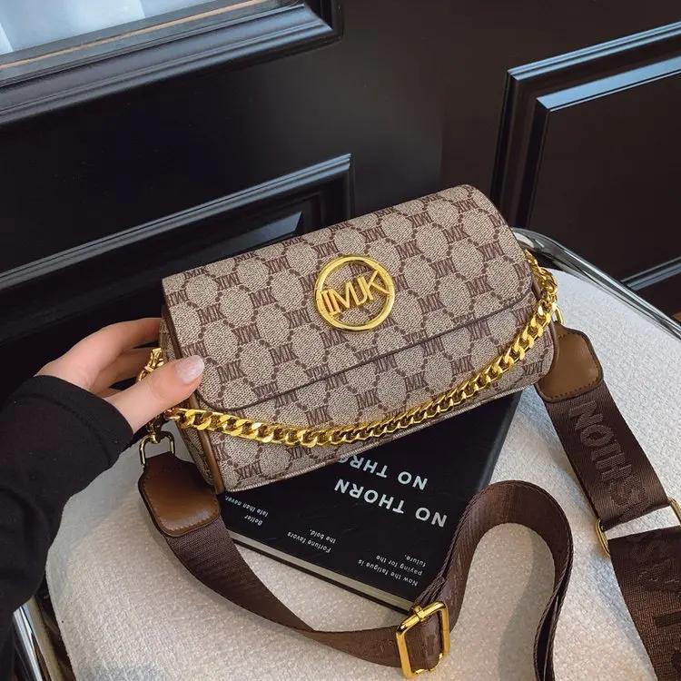 Sac à langer élégant en cuir classique populaire pour femmes, grande capacité, texturé, style rétro 