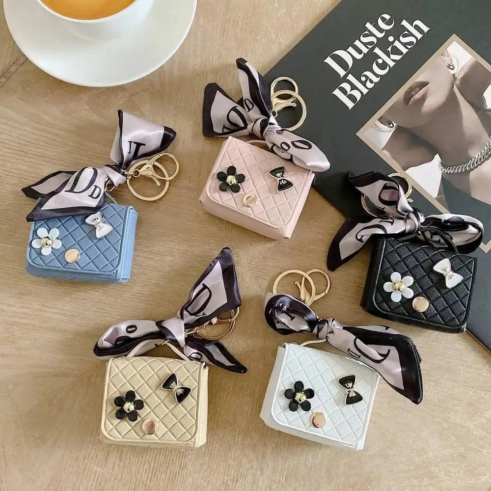 Sac de rangement pour écouteurs en cuir, Mini porte-clés créatif, pendentif de couleur unie, étui po