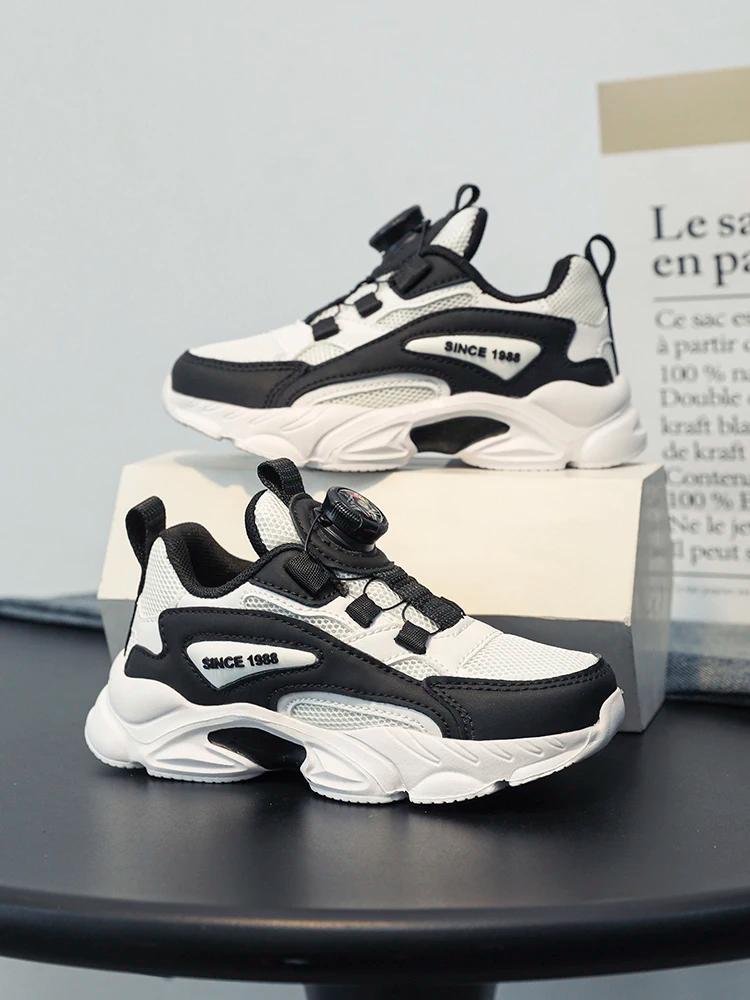 Boucle rotative à enfiler! Chaussures de sport noires en mesh pour enfants, respirantes et anti-chau