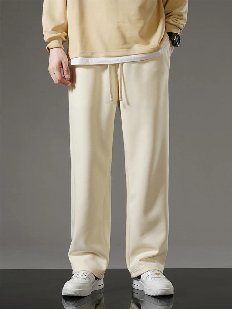 Printemps automne hommes pantalons de survêtement mode coréenne vêtements de sport cordon jambe larg