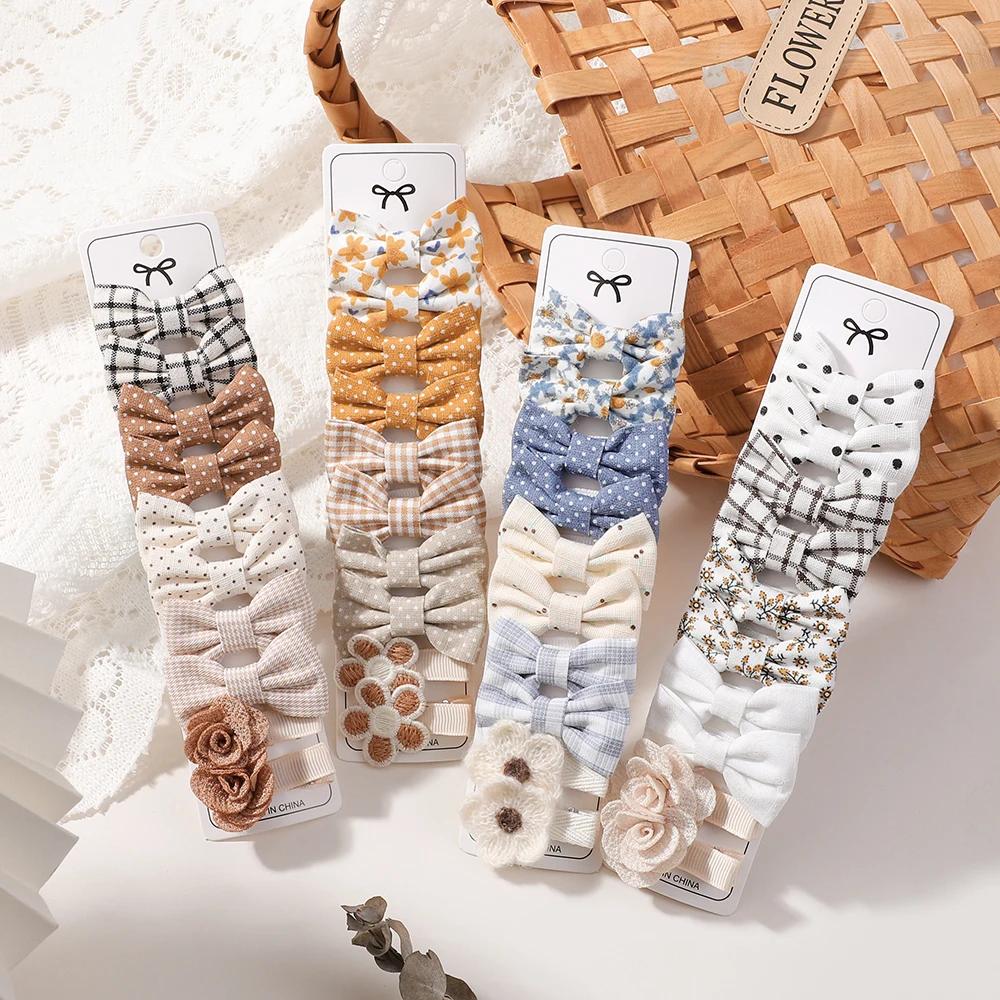 Bébé arcs 20 pièces/ensemble tissu fait à la main imprimé Barrette Boutique Mini Boutique frange arc
