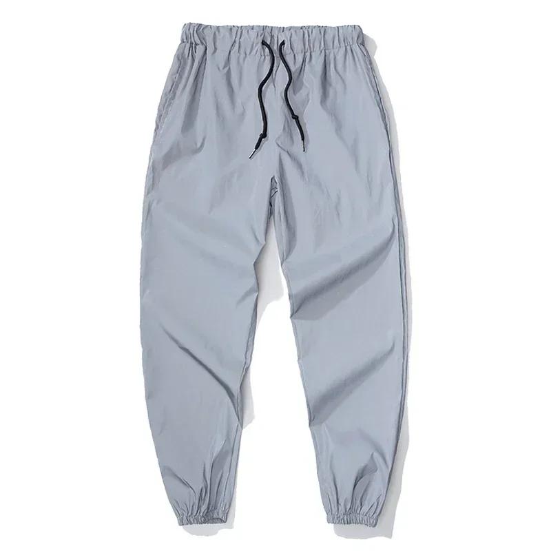 Pantalon décontracté réfléchissant de nuit pour hommes, taille élastique, mode Skateboard, Streetwea