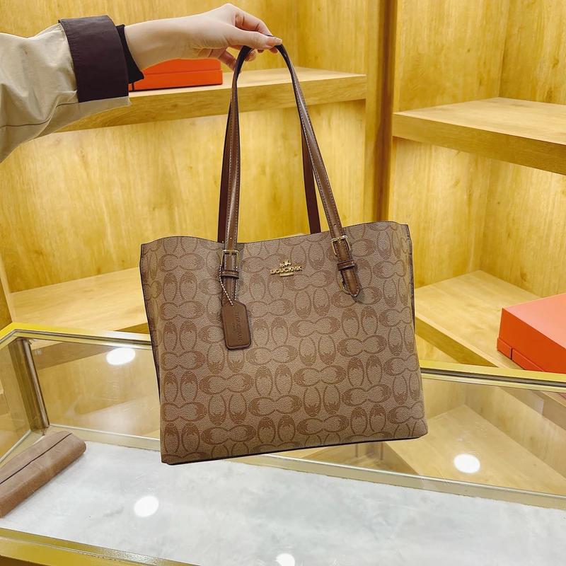 Sac à langer bandoulière tendance en cuir haut de gamme, style classique de créateur, décontracté, s