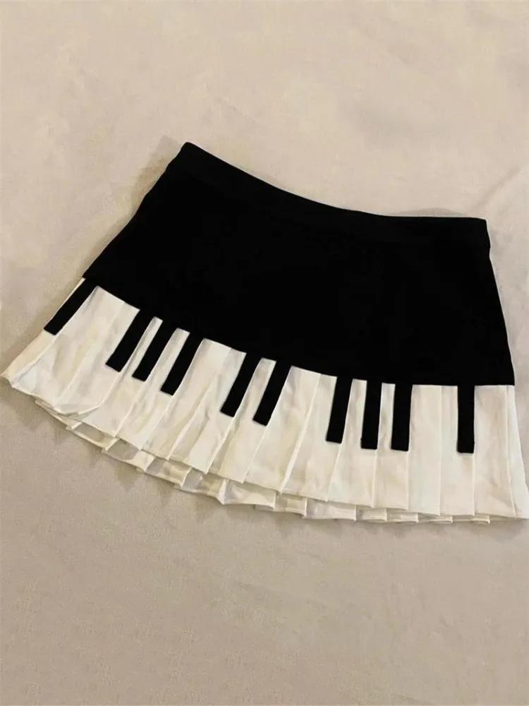 Printemps noir blanc épissé femmes jupe courte Y2k conception mince Harajuku Mini jupe femme Empire 
