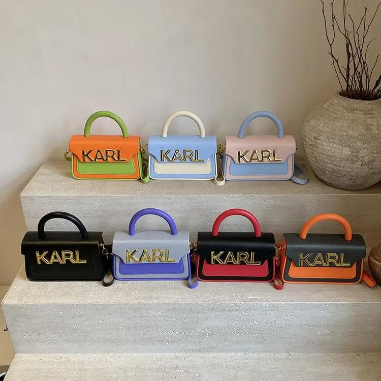 Sac à couches de rangement pratique avec plusieurs petites poches pour sucettes, lingettes et autres
