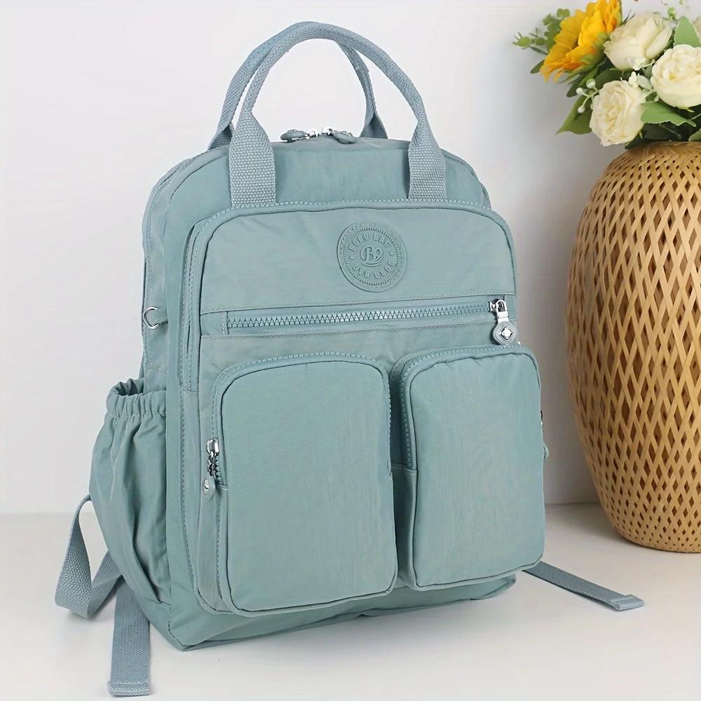 Sac à dos d'école léger de grande capacité, sac de voyage multi-poches, matériau en nylon résistant 