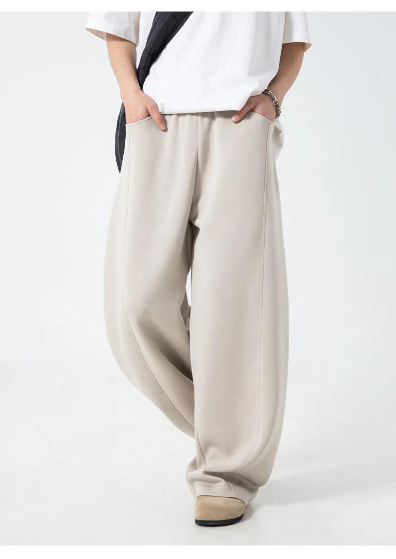 Pantalon décontracté texturé à coutures fendues pour hommes, surdimensionné, jambes incurvées, drapé