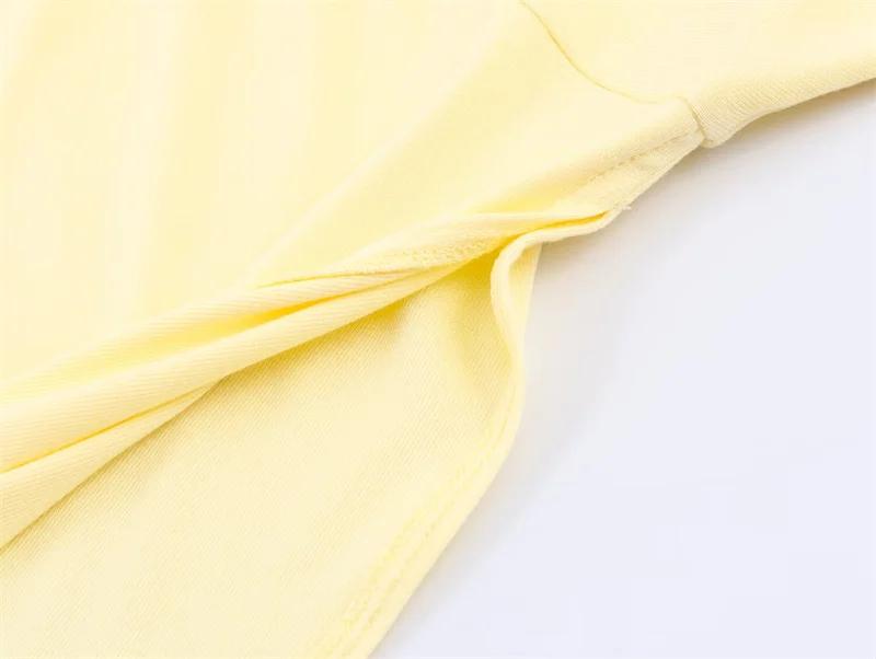 Haut asymétrique plissé décoratif jaune à col montant et manches courtes pour femme, nouvelle collec