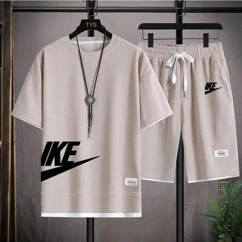 Vente chaude d'été hommes décontracté à manches courtes T-shirt shorts ensemble de sport en plein ai