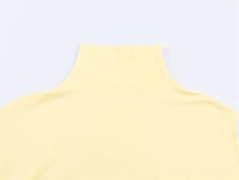 Haut asymétrique plissé décoratif jaune à col montant et manches courtes pour femme, nouvelle collec