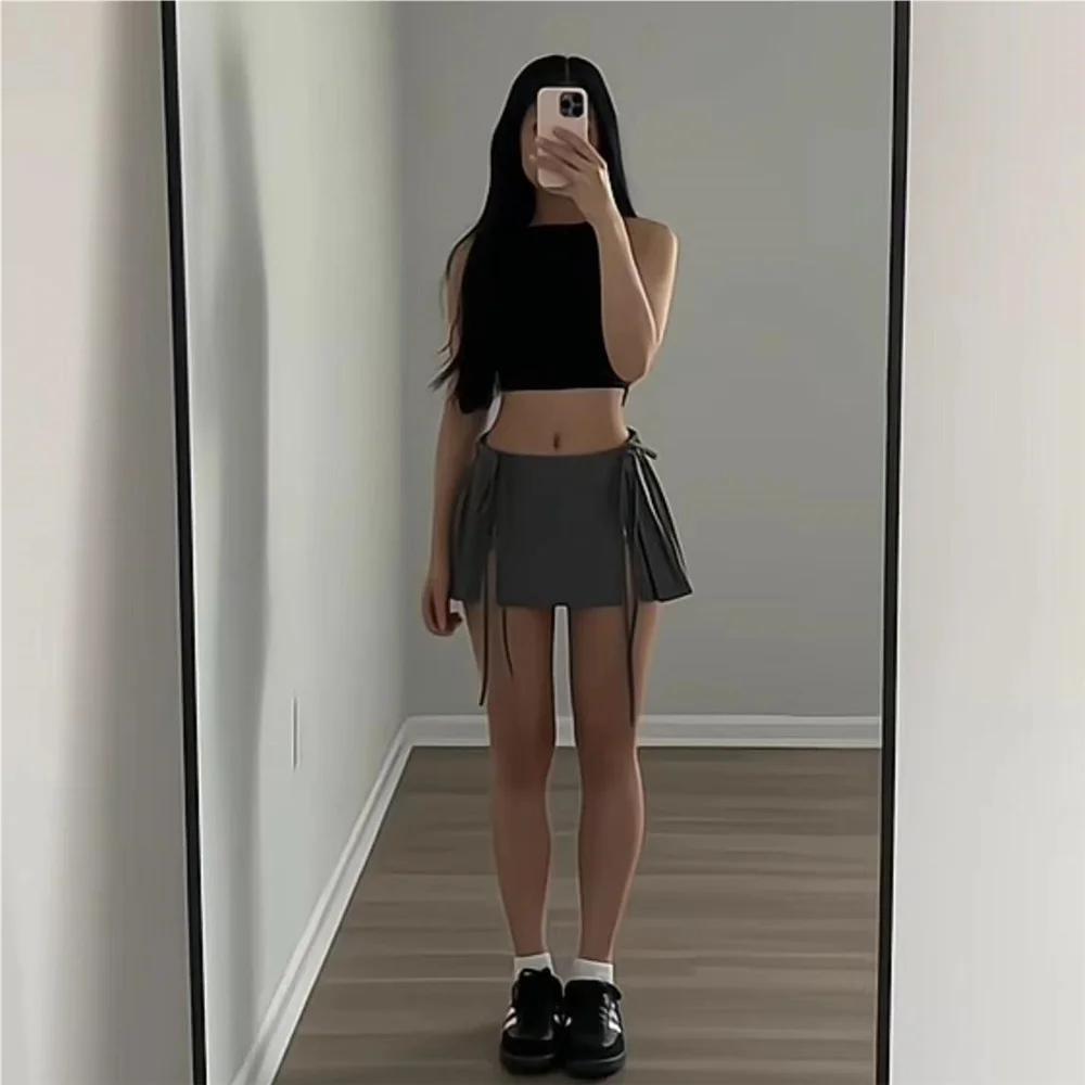 Mini jupe plissée taille haute pour femmes, vêtements de créateurs, fermeture éclair blanche, mode K