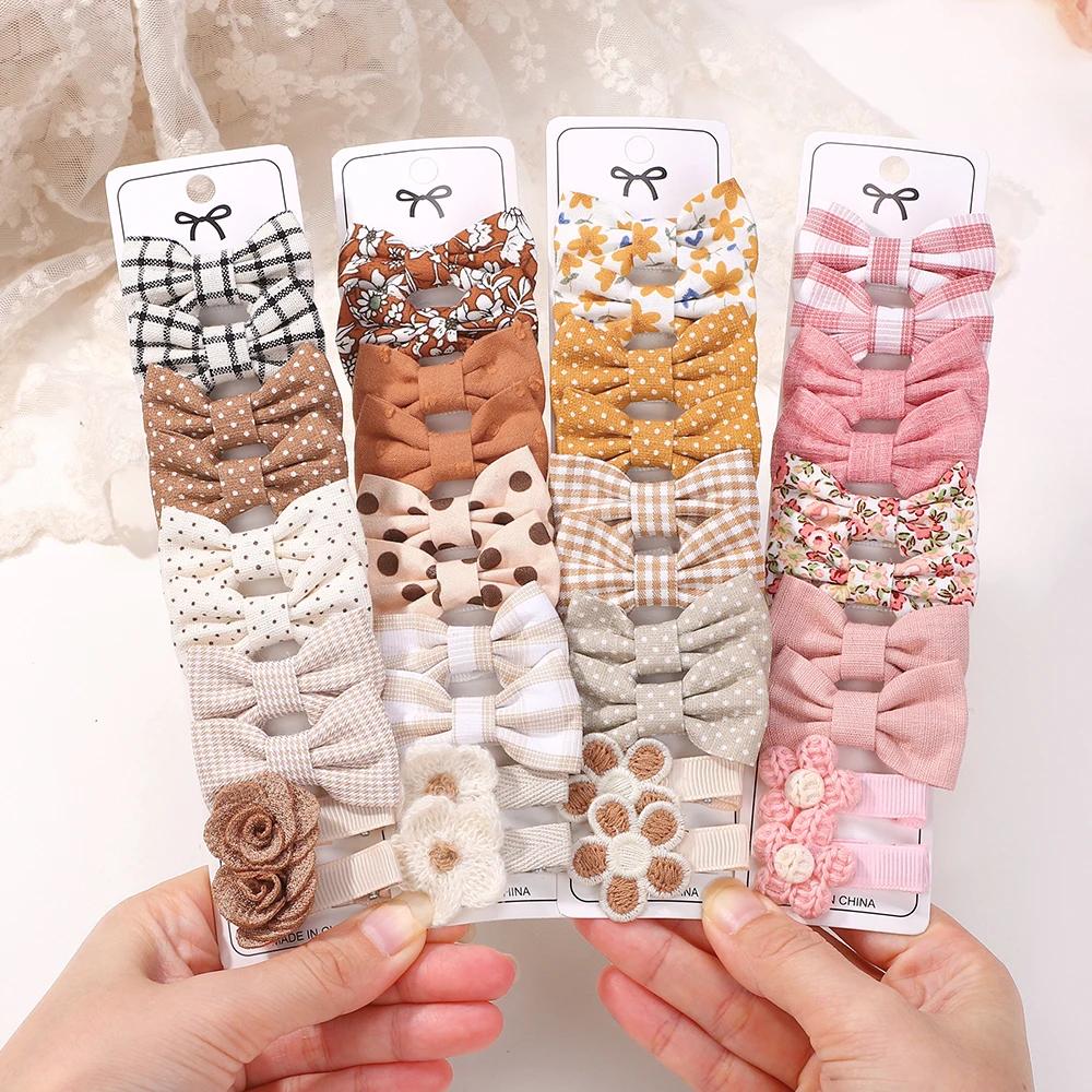 Bébé arcs 20 pièces/ensemble tissu fait à la main imprimé Barrette Boutique Mini Boutique frange arc