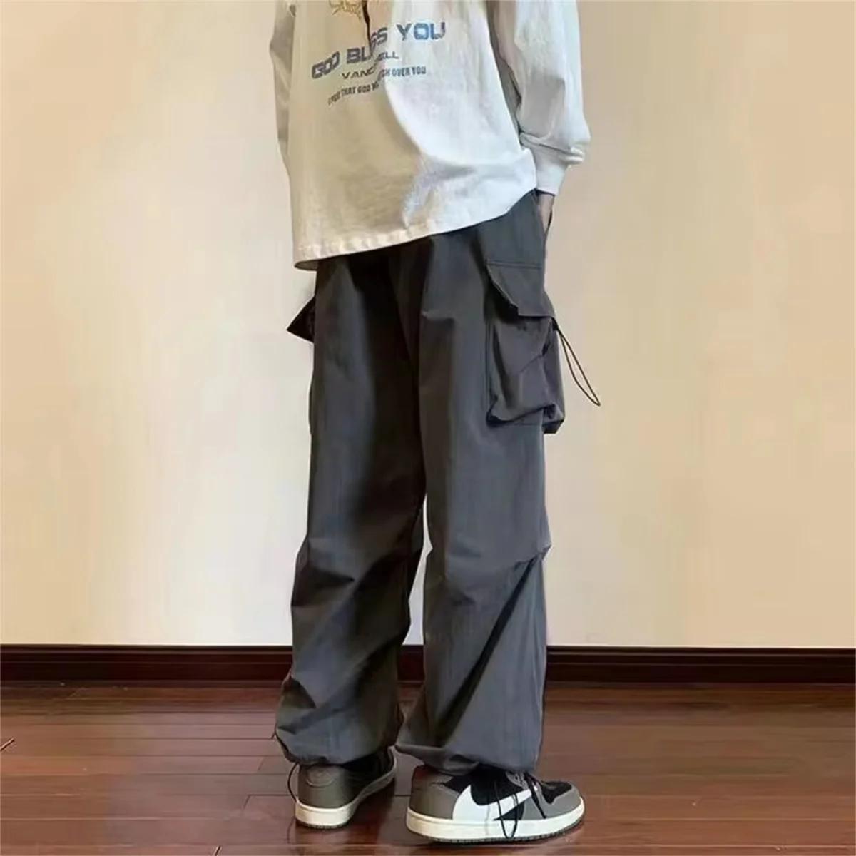 Streetwear 2024 printemps sarouel pantalons décontractés hommes taille élastique couleur unie Cargo 