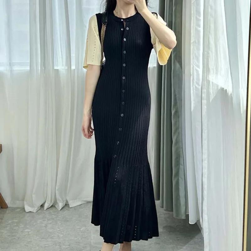 Robe tricotée française ajourée à la mode, style d'été, amincissante, ligne a, manches courtes, robe