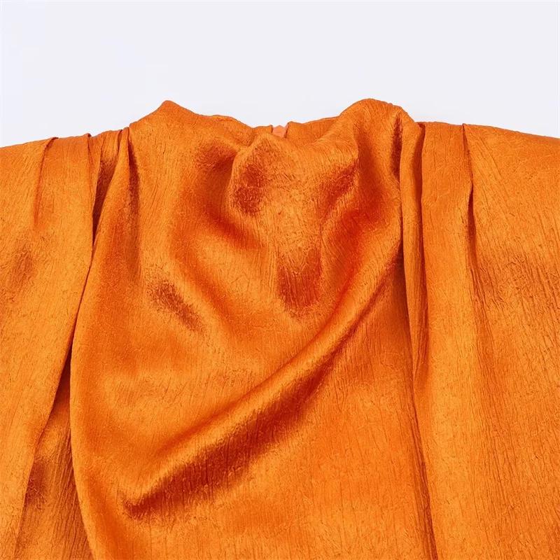 Haut pour femme Nouvelle Collection Printemps 2026 Orange Sans Manches Texture Satinée Longue Tresse