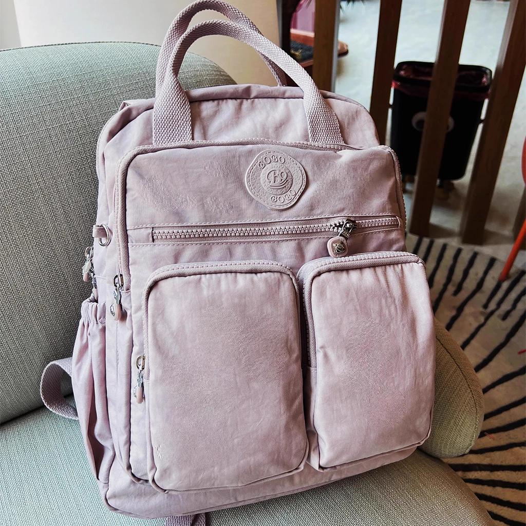 Sac à dos multi-poches pour femmes, sac à dos de voyage en Nylon de couleur unie à poignée souple, l