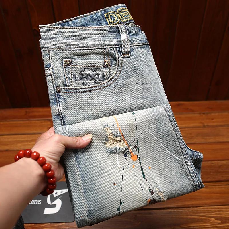 Jean déchiré pour hommes, coupe slim avec petits pieds, imprimé d'encre éclaboussée, pantalon à la m