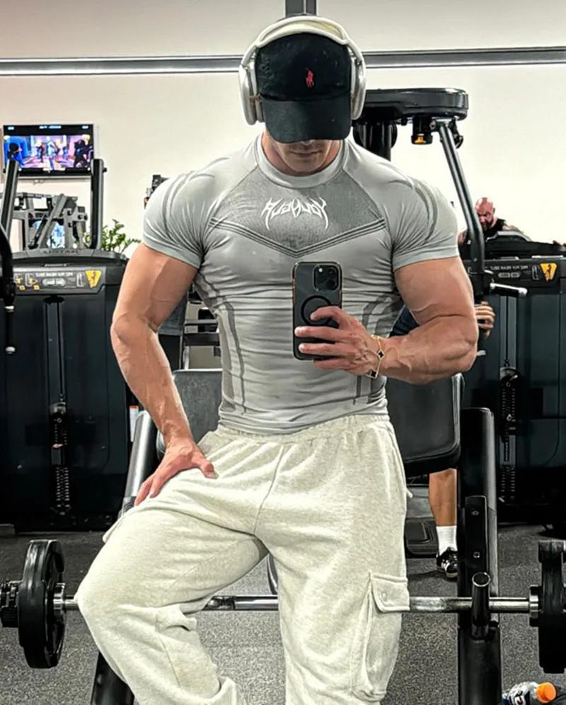 T-shirt de compression à manches courtes pour homme, imprimé tribal, hauts d'entraînement respirants