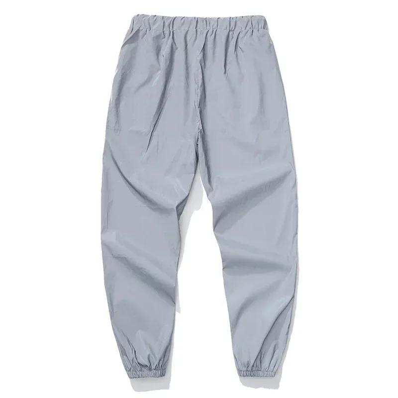 Pantalon décontracté réfléchissant de nuit pour hommes, taille élastique, mode Skateboard, Streetwea