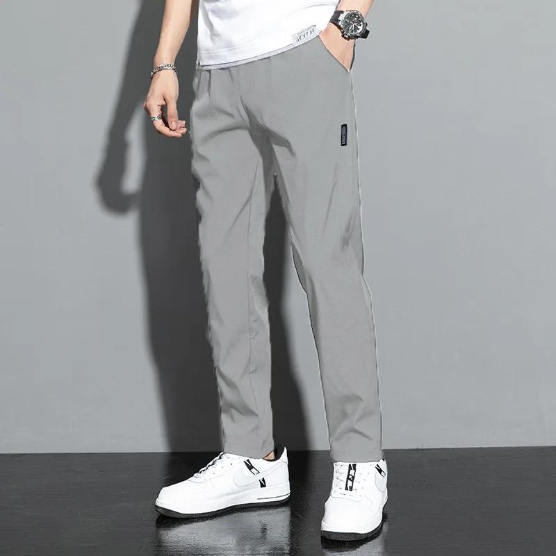 Pantalons pour hommes 2025 été nouveau noir gris mince affaires pantalons décontractés en plein air 
