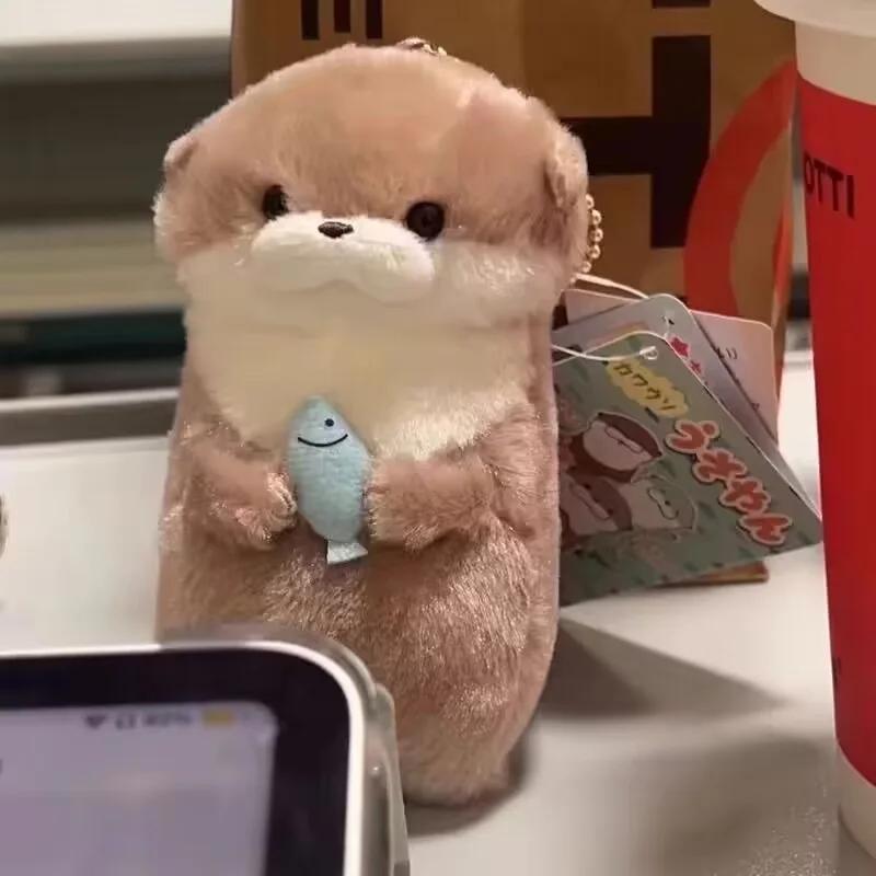Mignon petite loutre câlin poisson en peluche poupée pendentif poupée cadeau mignon fille coeur port