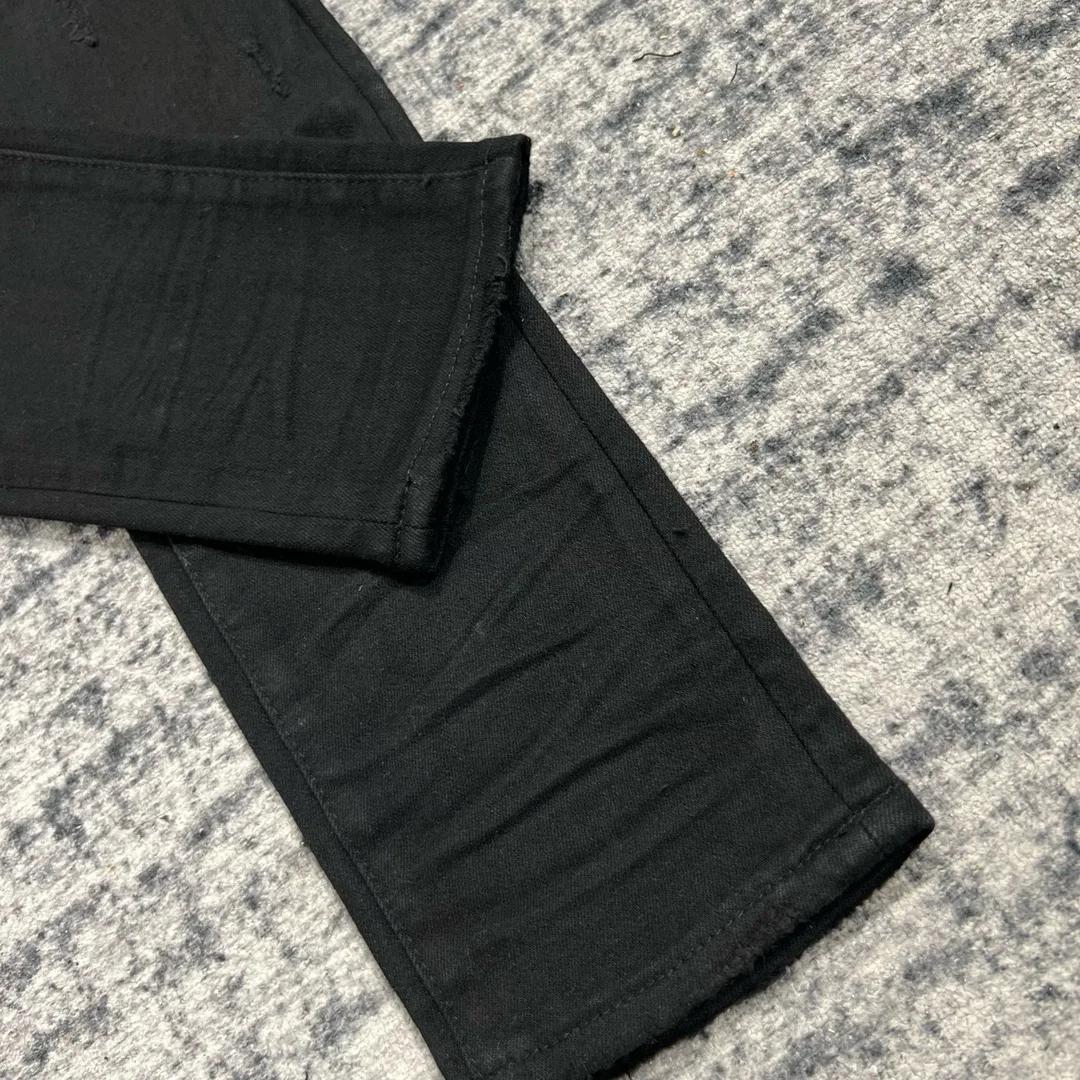 jeans noirs skinny en cuir côtelé pour hommes