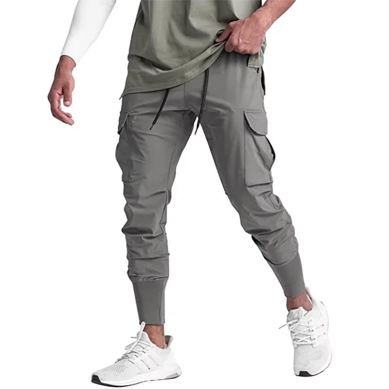 Nouveau pantalon de sport camouflage pour homme, pantalon de fitness d'été fin, ample, à séchage rap