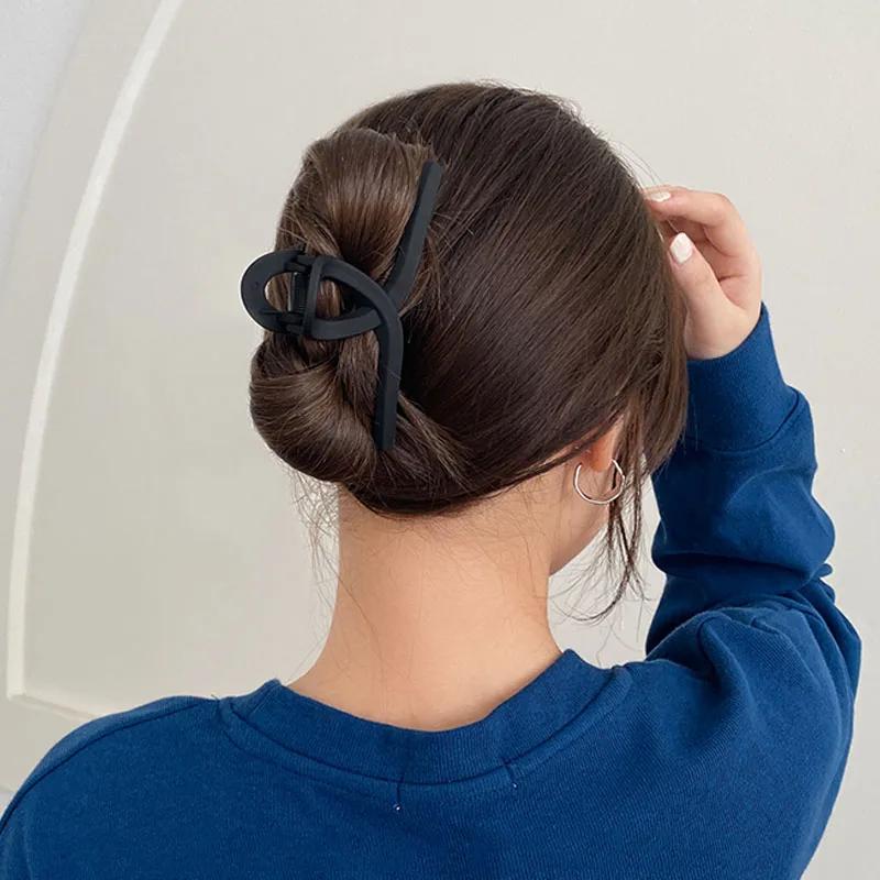 Pince à cheveux élégante noire géométrique en plastique pour femme, support de cheveux longs, pinces