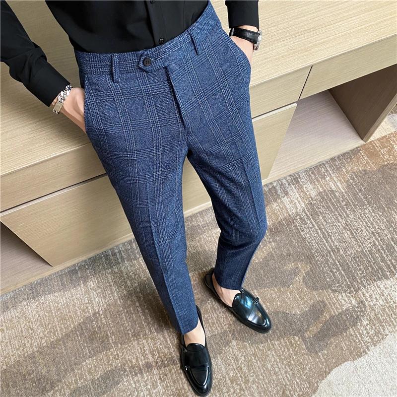 Les pantalons à carreaux pour hommes de printemps et d'automne sont tendance, à la mode, cool et pol