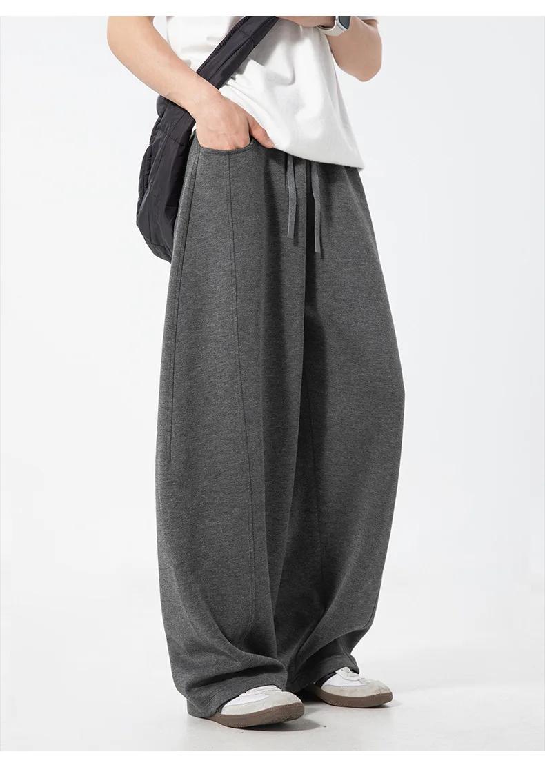 Pantalon décontracté texturé à coutures fendues pour hommes, surdimensionné, jambes incurvées, drapé