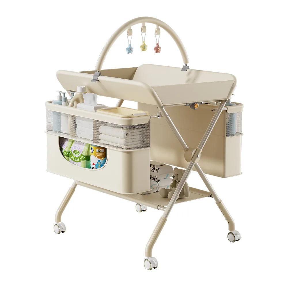 Table à langer pour bébé avec design multifonctionnel pliable, hauteur réglable, construction stable