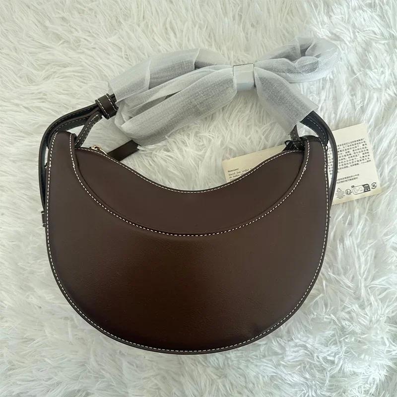 Sac à bandoulière pour femme en cuir véritable, style croissant, design original avec fermeture écla
