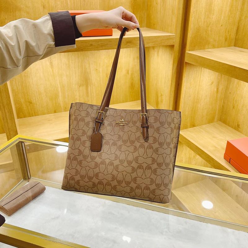 Sac à langer bandoulière tendance en cuir haut de gamme, style classique de créateur, décontracté, s