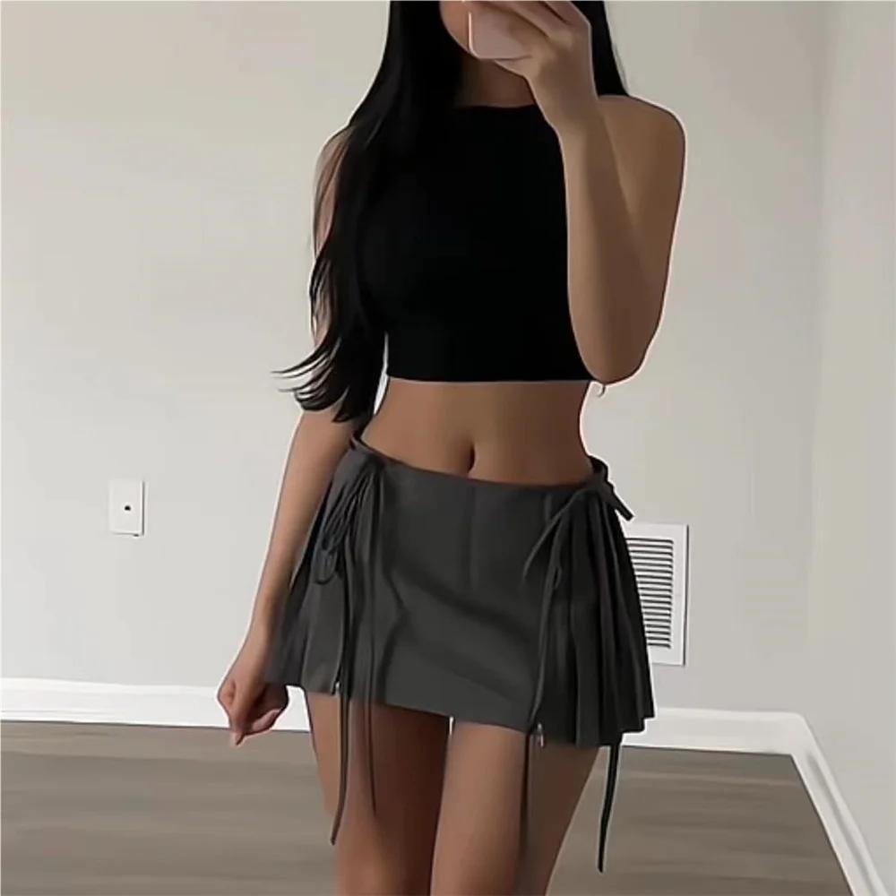Mini jupe plissée taille haute pour femmes, vêtements de créateurs, fermeture éclair blanche, mode K