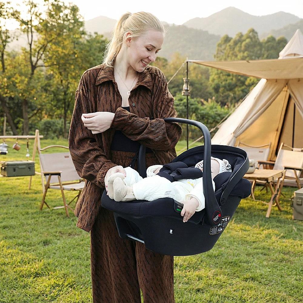 Siège auto pour bébé Babyvoyage noir avec base Isofix, protection solaire UPF45+, confortable, respi