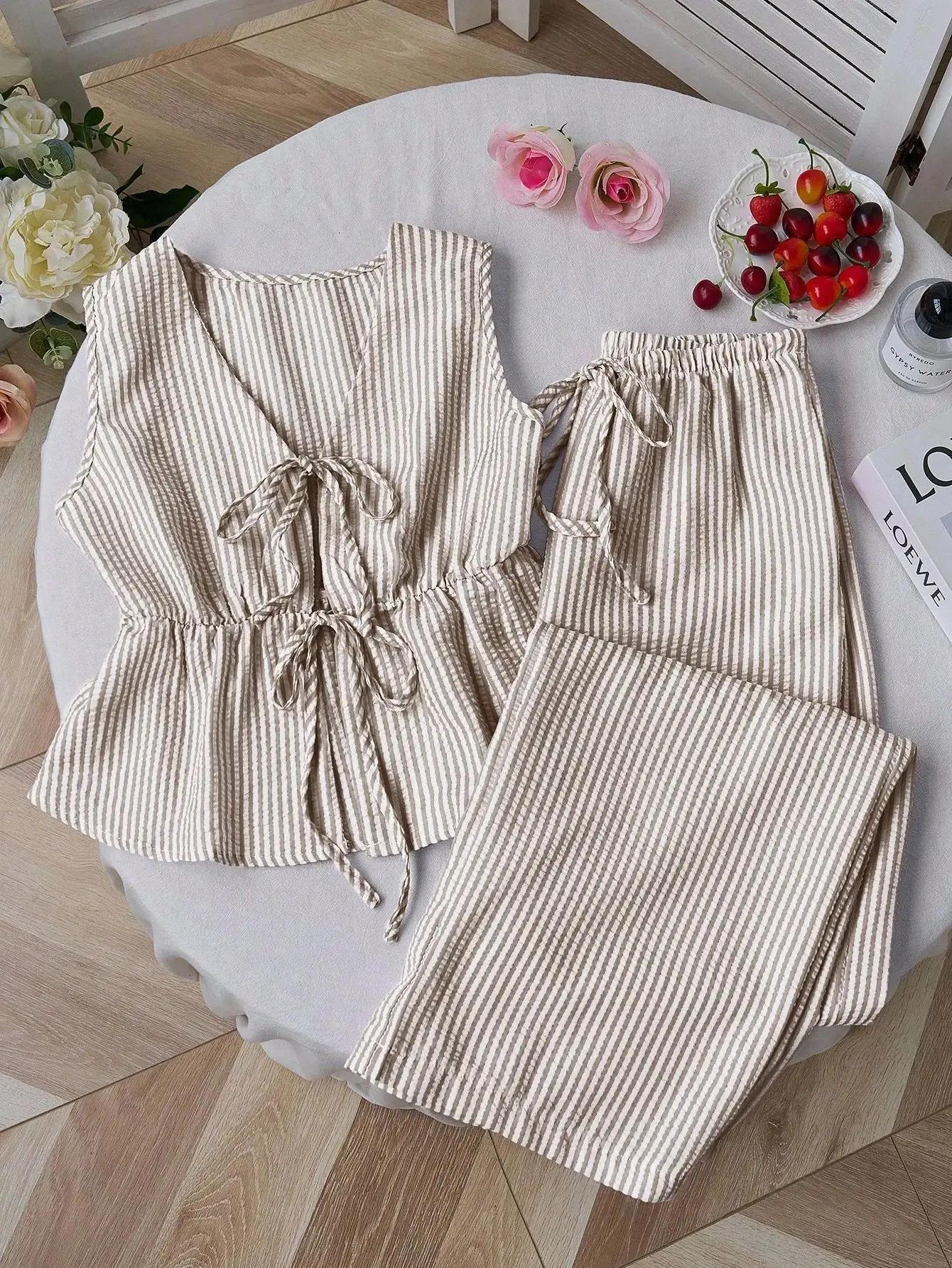 Ensemble deux pièces été 2026 pour femme : Blouse rayée sans manches à col en V et lacets, pantalon 