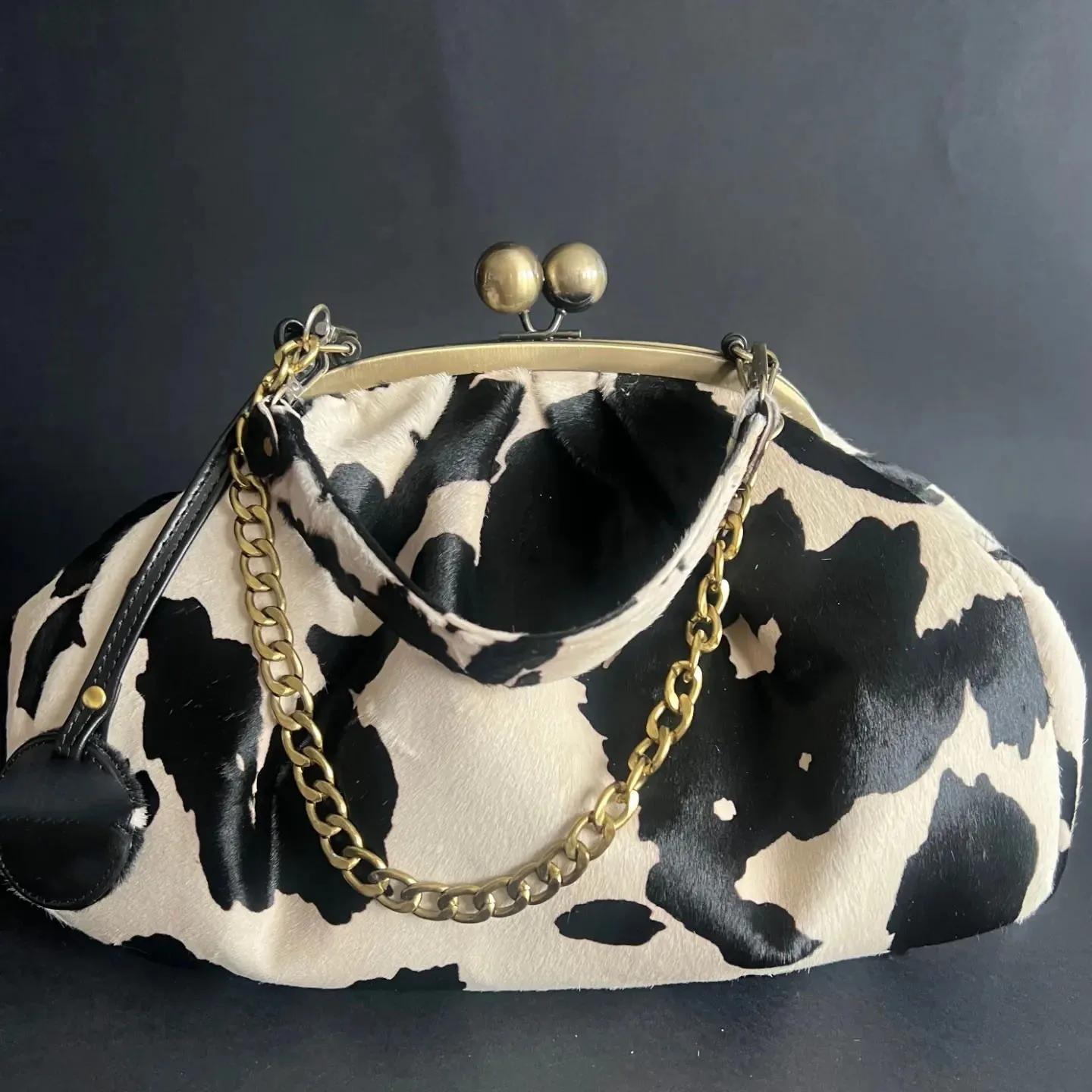 LOST IN VINTAGE – pochette en tissu à motif de vache, cadre métallique, serrure à baiser et poignée 