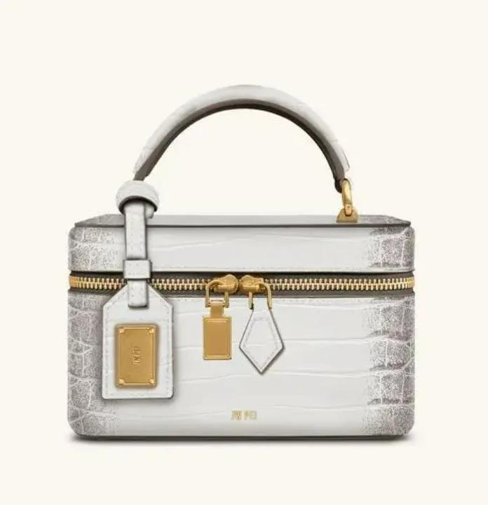 Sac bandoulière de luxe pour femme en cuir texturé avec logo lettre, également un élégant sac à lang