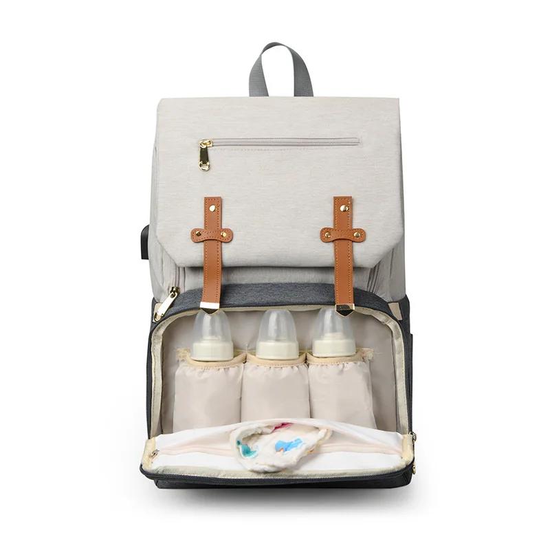 Sac de maman multifonctionnel avec coussin d'air de décompression, sac de mère et de bébé pour sorti