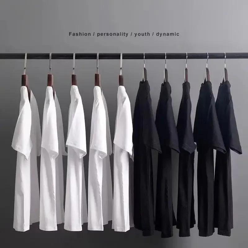 Nouveau t-shirt à manches courtes en coton 100% pur, adapté aux hommes et aux femmes. C'est un style